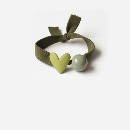 Forest Gifty - Bead Charm Hair Tie on neutral background