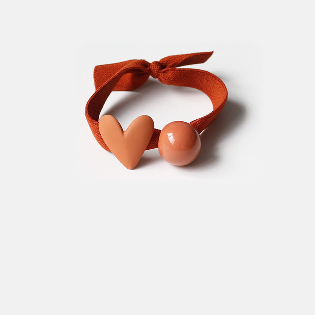 OrangeRed Gifty - Bead Charm Hair Tie on neutral background