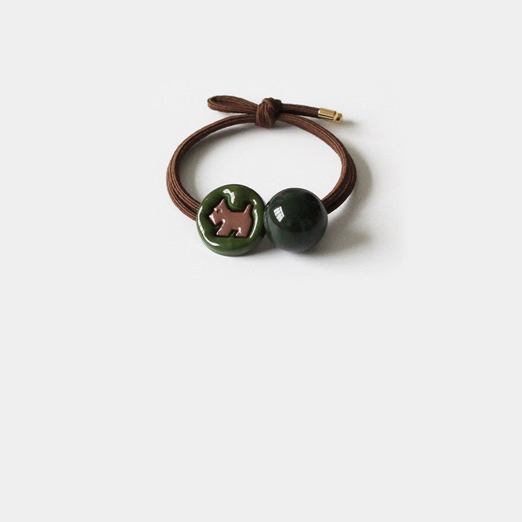 Dog Gifty - Green Charm Hair Tie on neutral background