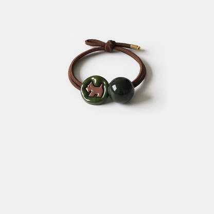 Dog Gifty - Green Charm Hair Tie on neutral background