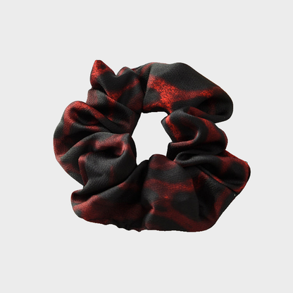 LeopardRed Gifty - Leopard Glossy Scrunchie on neutral background