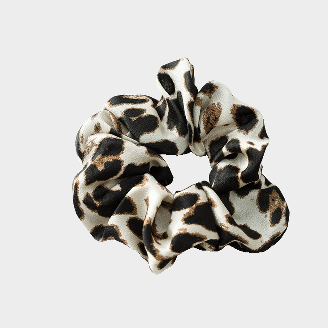 LeoBlkWht Gifty - Leopard Glossy Scrunchie on neutral background