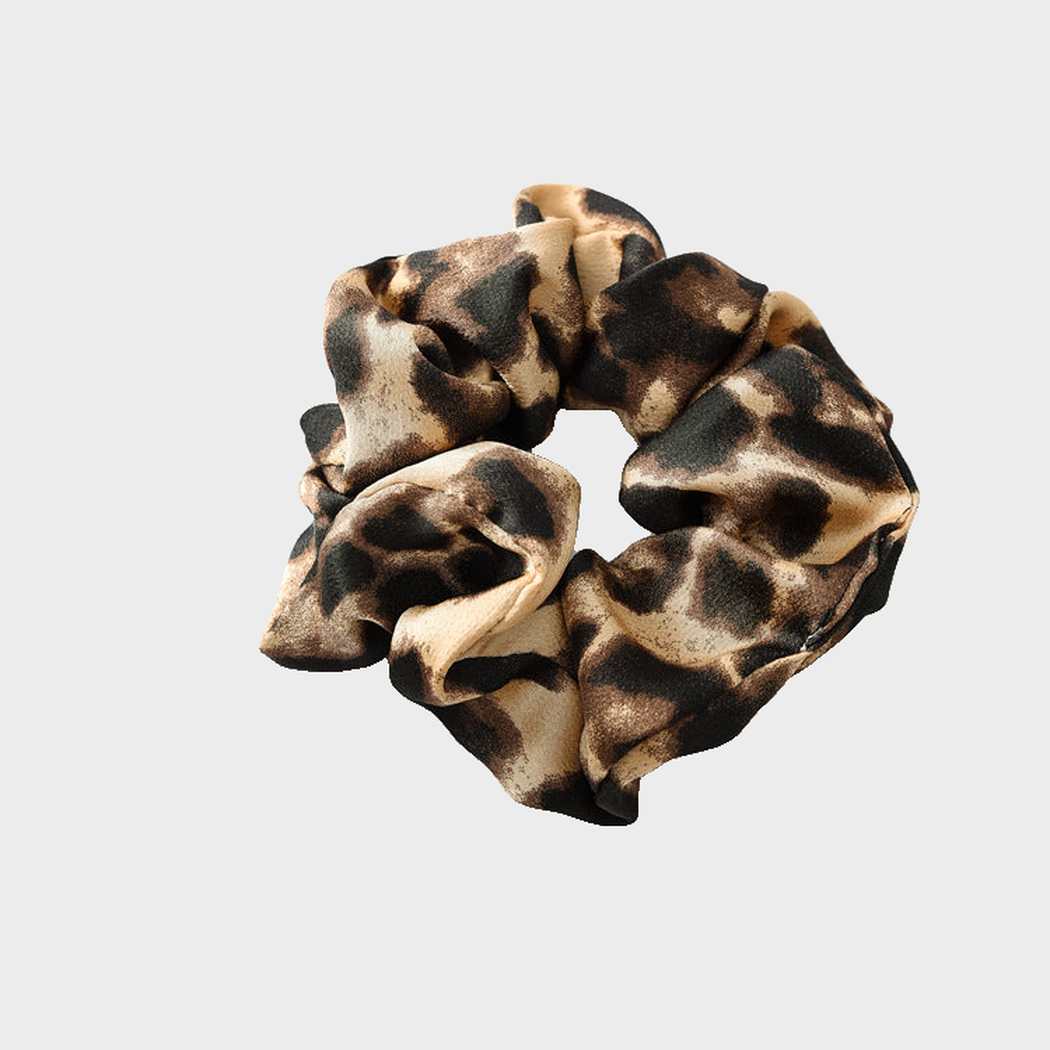 LeoLtBrown Gifty - Leopard Glossy Scrunchie on neutral background