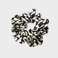 SmLeoBW Gifty - Leopard Glossy Scrunchie on neutral background
