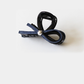 CrossDark Beau - Crossed Solid Hair Claw on neutral background