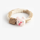 MonsPink Gifty - Monster Label Hair Tie on neutral background