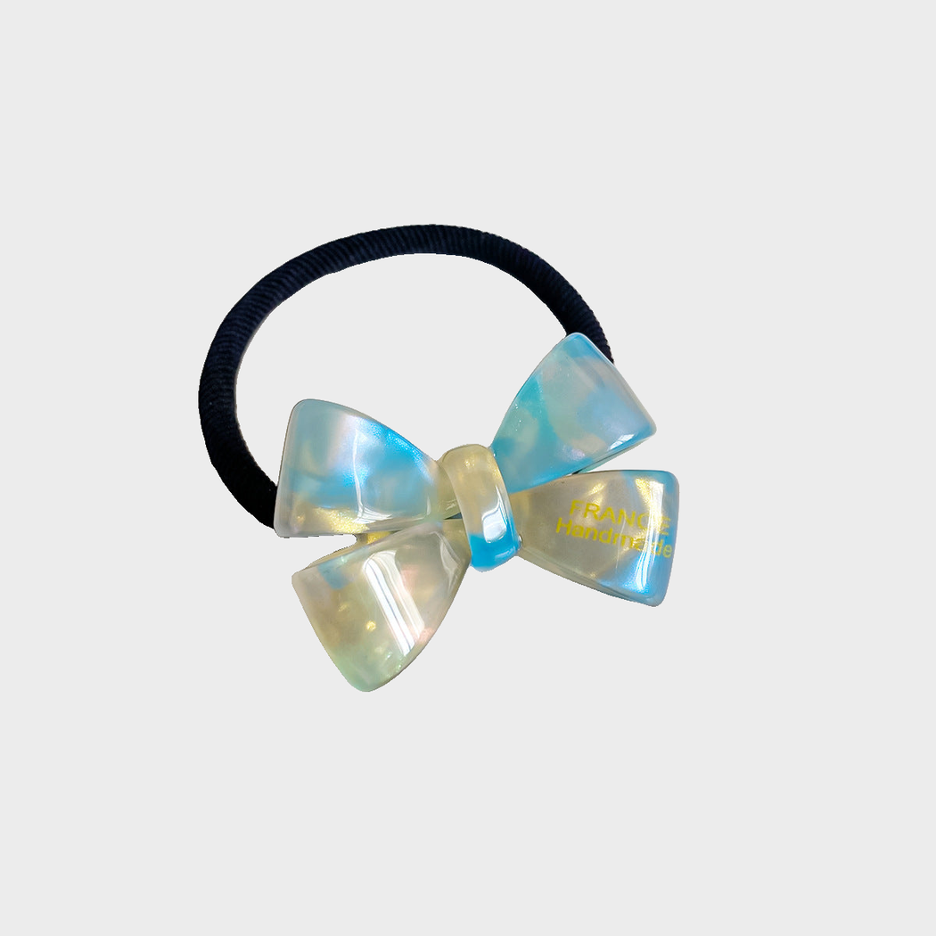 IridBluGrn Gifty - Iridescent Bow Hair Tie on neutral background