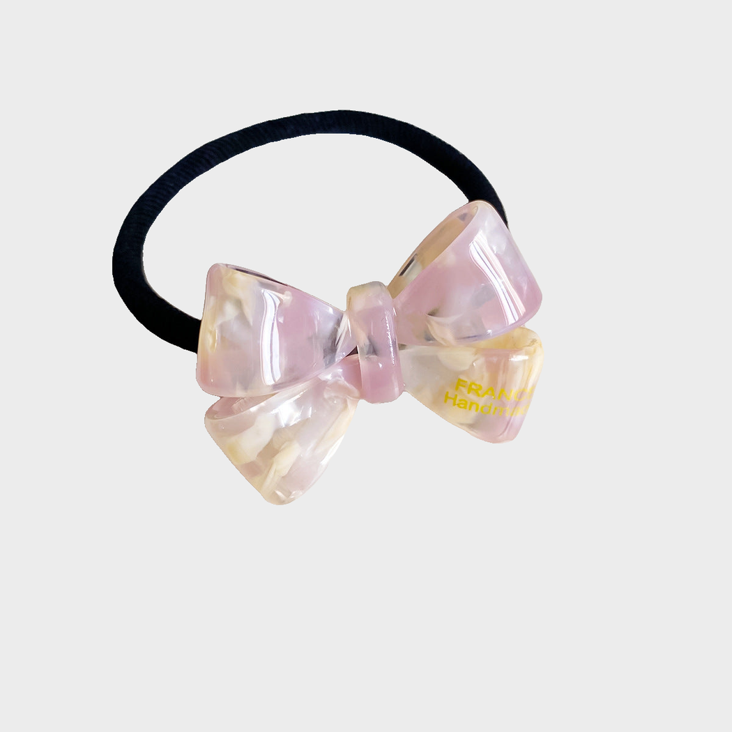 IridYlwPnk Gifty - Iridescent Bow Hair Tie on neutral background