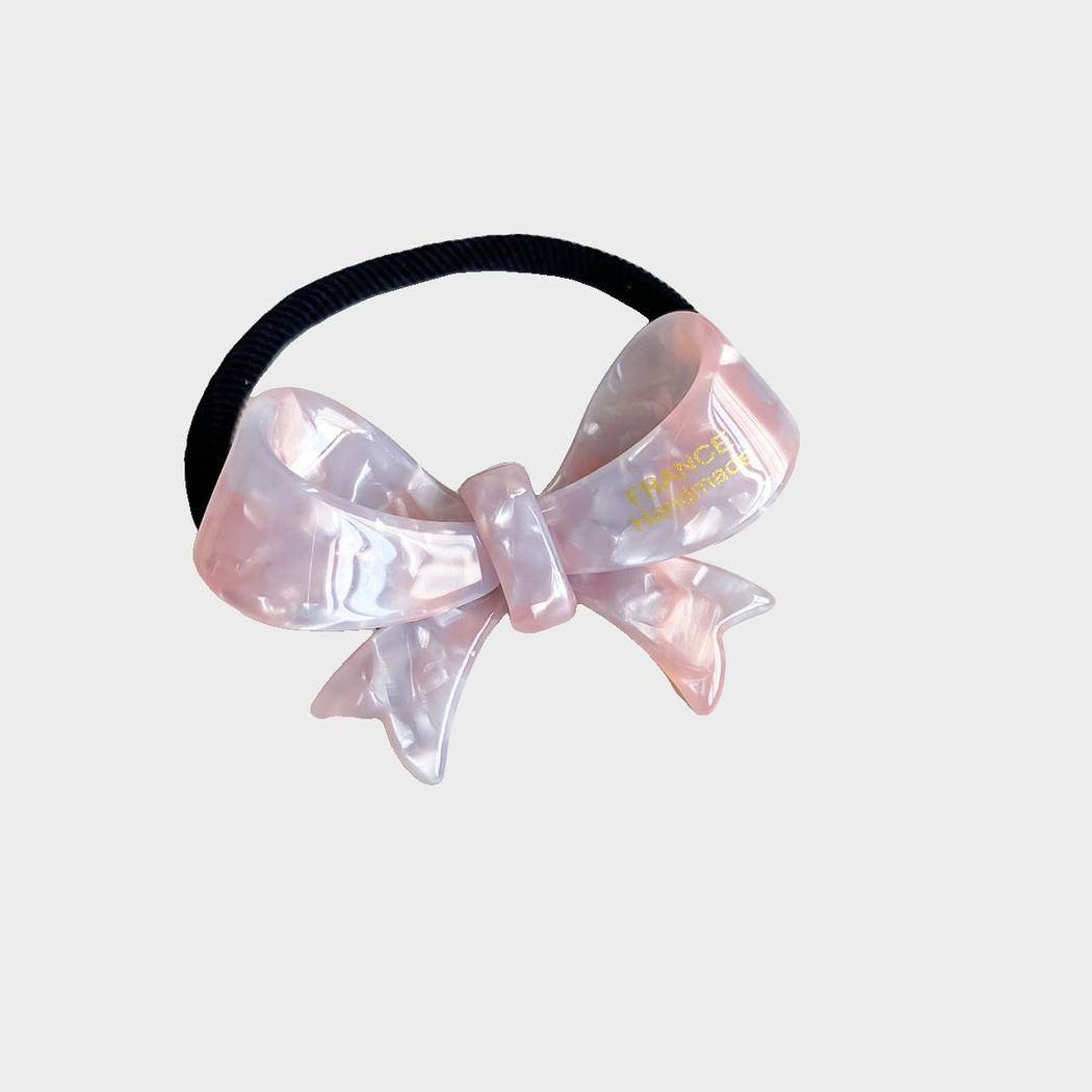 IridPurPnk Gifty - Iridescent Bow Hair Tie on neutral background