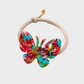 VintageRed Gifty - Butterfly Charm Hair Tie on neutral background