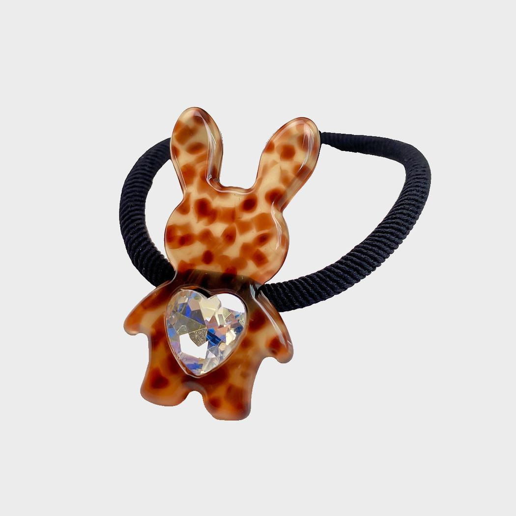 Leopard Gifty - Mixed Pattern Bunny Charm Hair Tie on neutral background