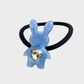 Blue Gifty - Mixed Pattern Bunny Charm Hair Tie on neutral background