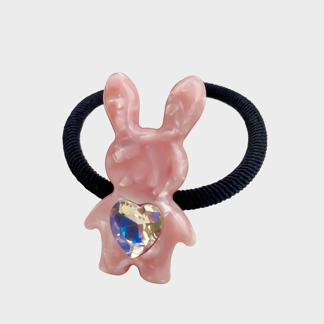 Pink Gifty - Mixed Pattern Bunny Charm Hair Tie on neutral background