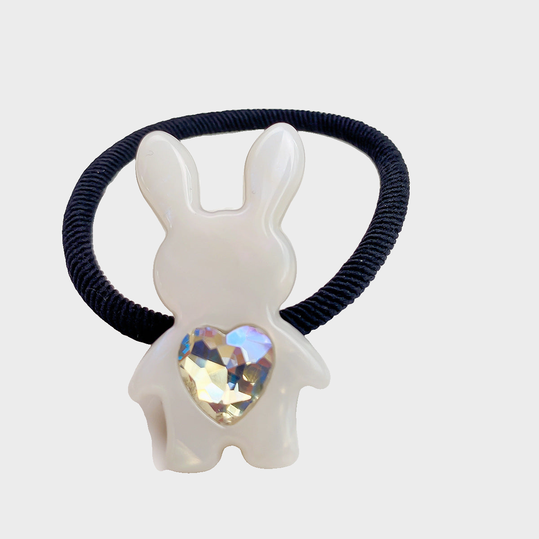 IridWhite Gifty - Mixed Pattern Bunny Charm Hair Tie on neutral background