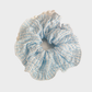 SkyBlue Gifty - Floral Ruched Scrunchie on neutral background