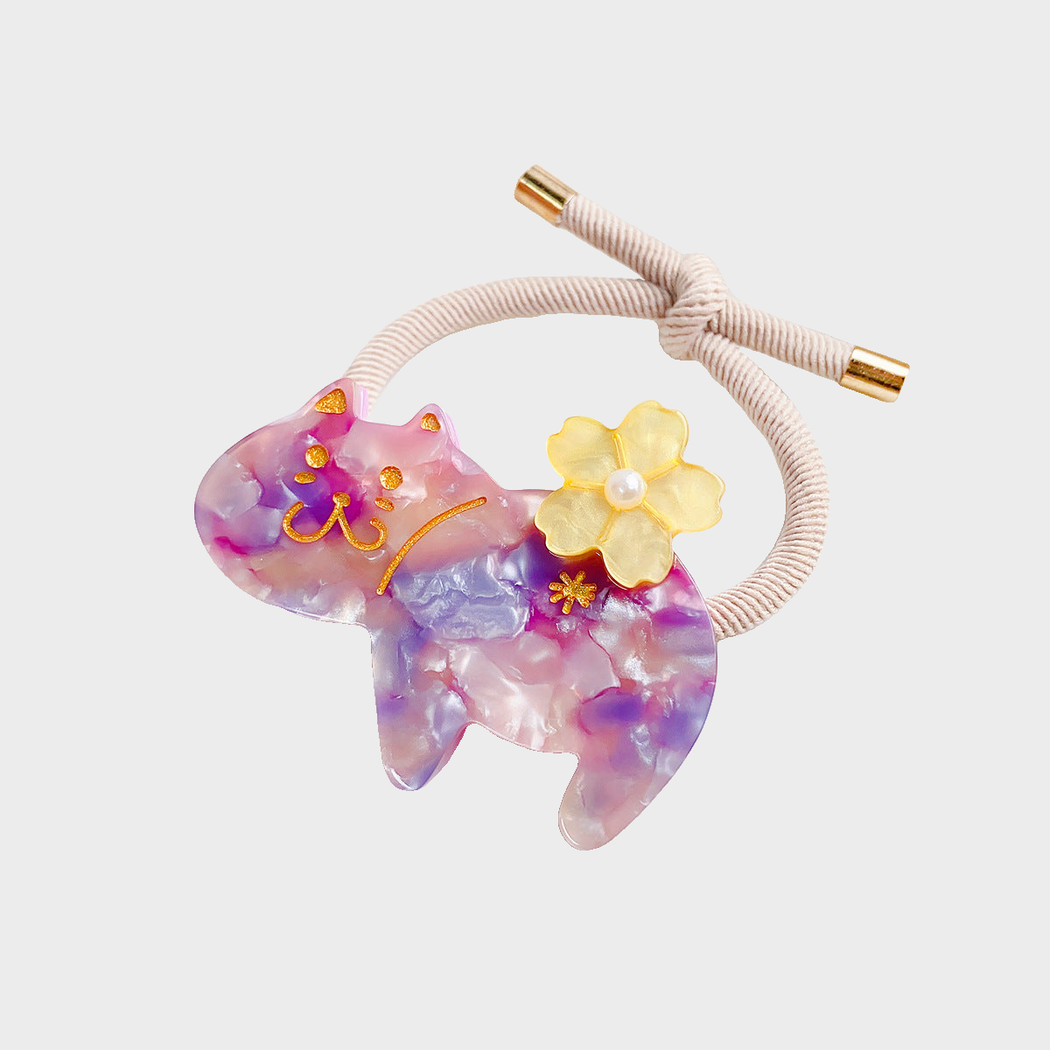 FlrlPurp Gifty - Marbled Cat Hair Tie on neutral background