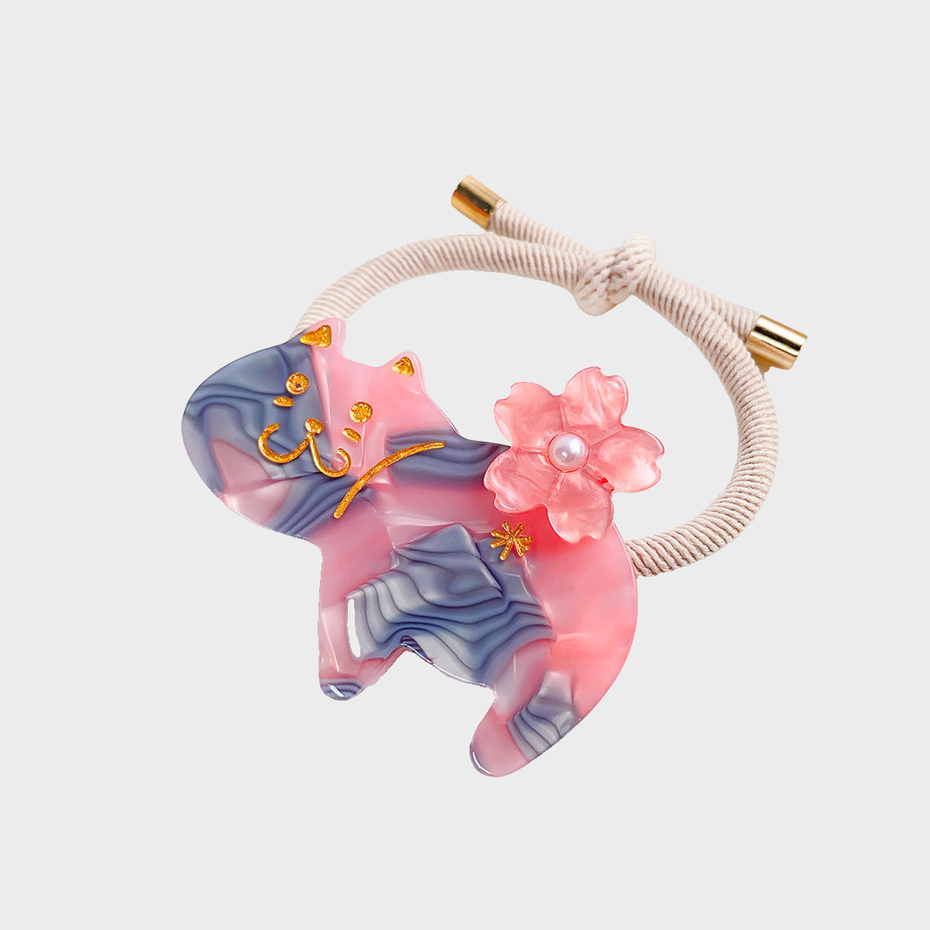 GrayPink Gifty - Marbled Cat Hair Tie on neutral background