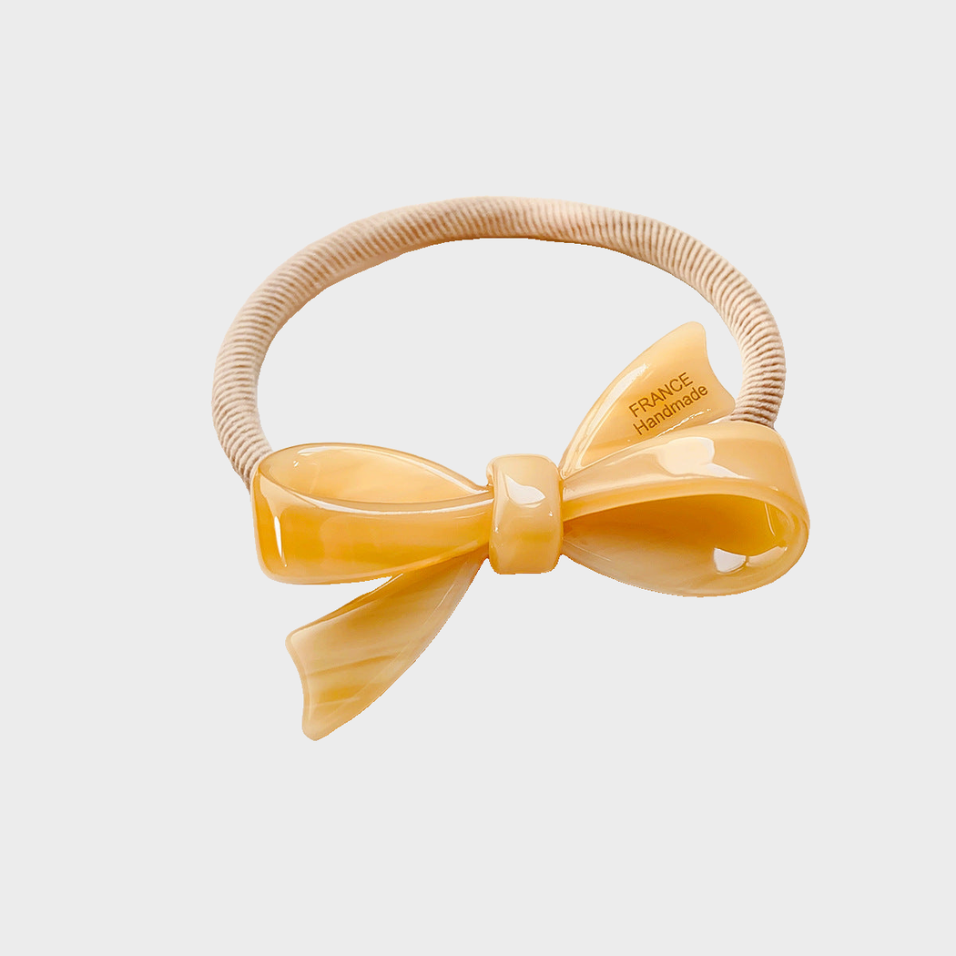 Cream Gifty - 3D Bow Hair Tie on neutral background
