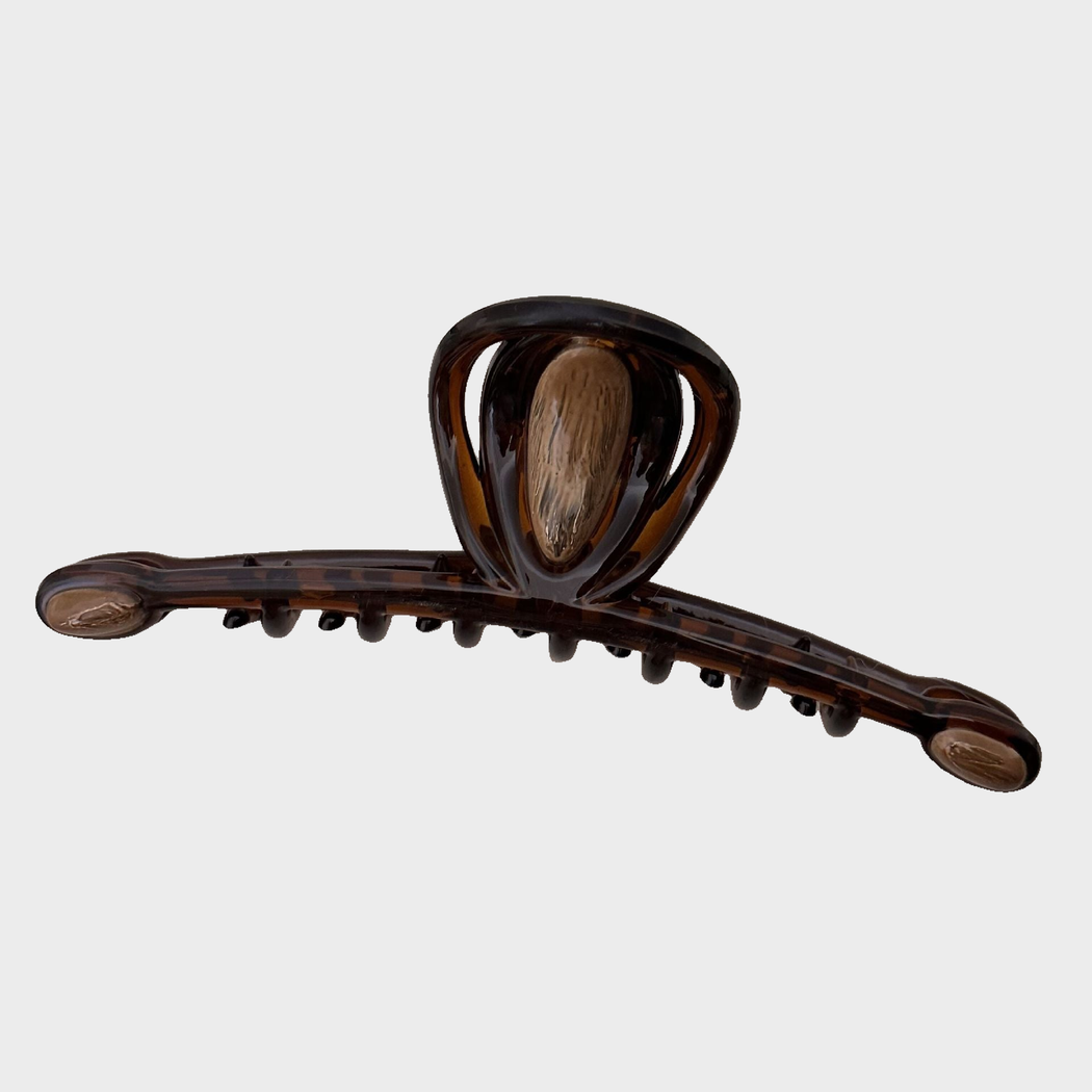 Amber Beau - Caramel Loop Long Hair Claw on neutral background