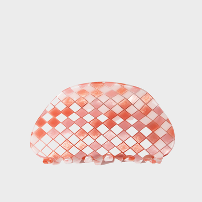 Pink Beau - Checkered Semicircle Hair Claw on neutral background