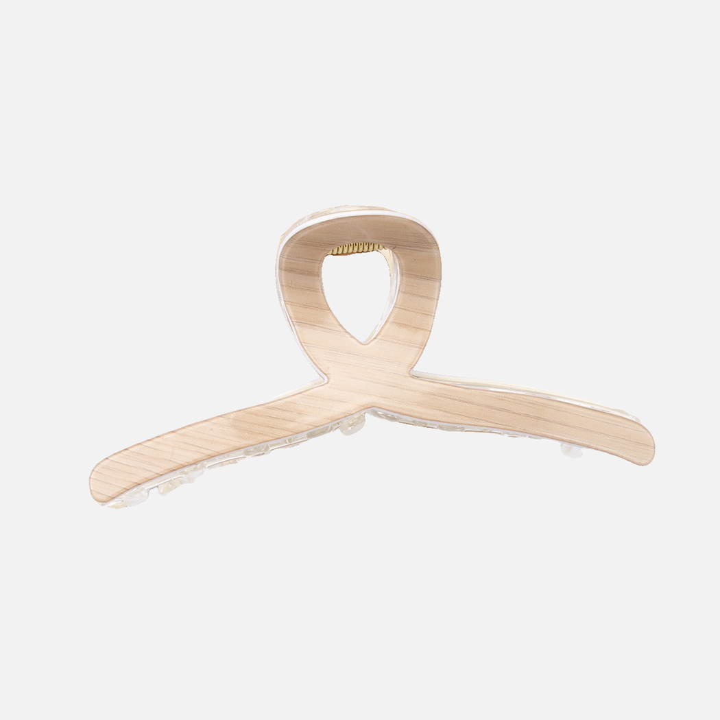 Peach Beau - Curved Loop Handle Hair Claw on neutral background