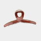 RedBrown Beau - Curved Loop Handle Hair Claw on neutral background