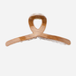 Brown Beau - Curved Loop Handle Hair Claw on neutral background