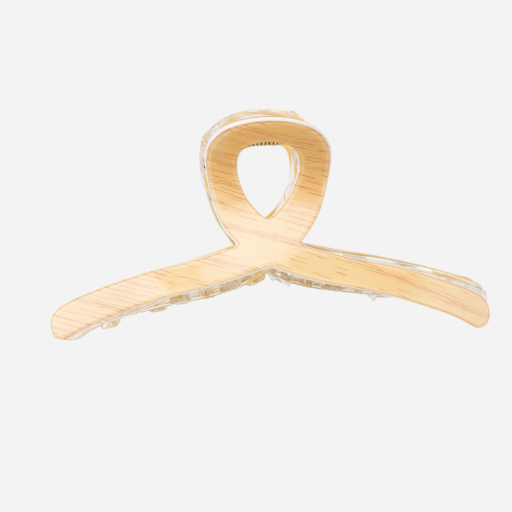 Beige Beau - Curved Loop Handle Hair Claw on neutral background