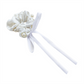 White beaded bow scrunchie on a white background
