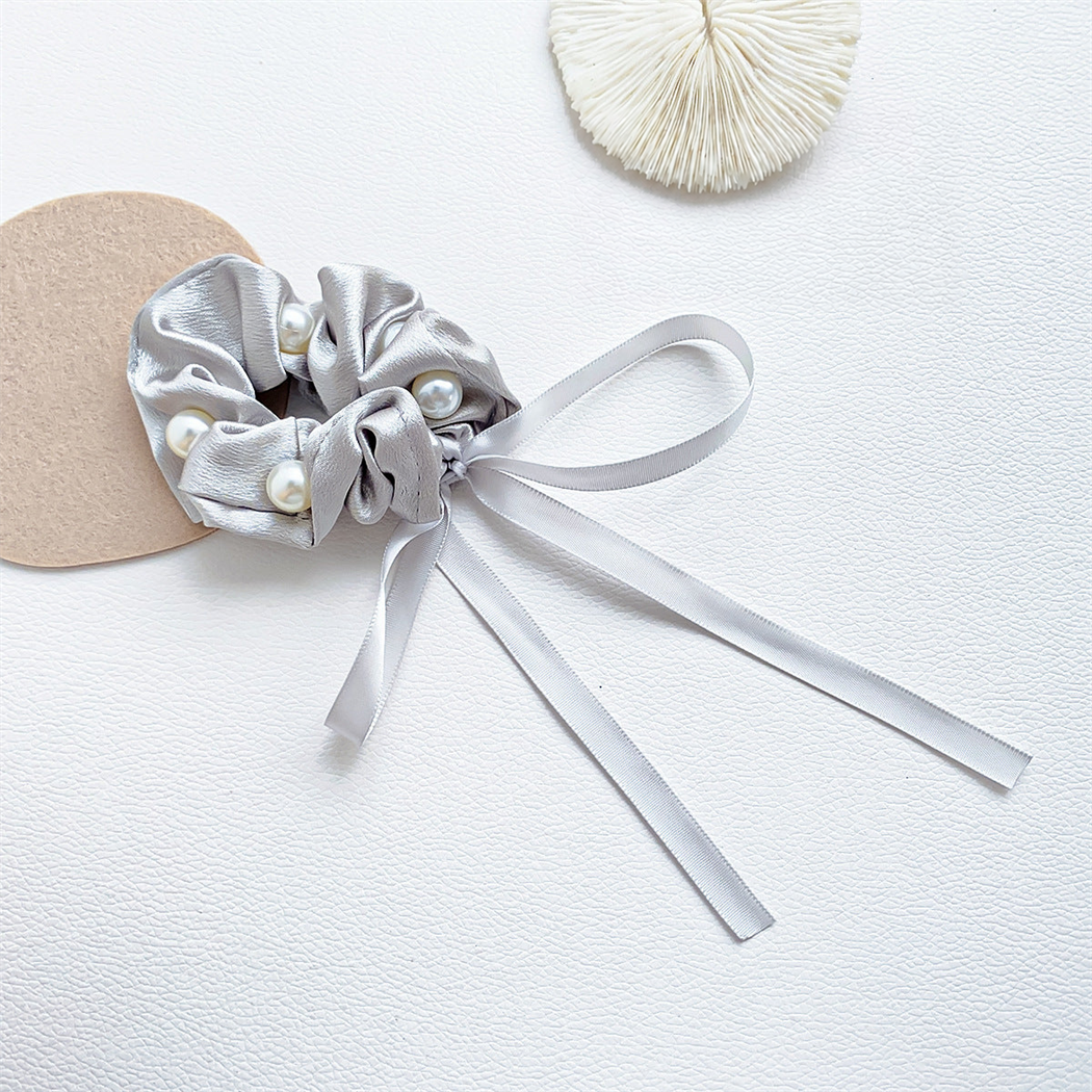 Gray beaded bow scrunchie with trailing ribbons