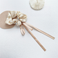 Champagne beaded bow scrunchie with trailing ribbons
